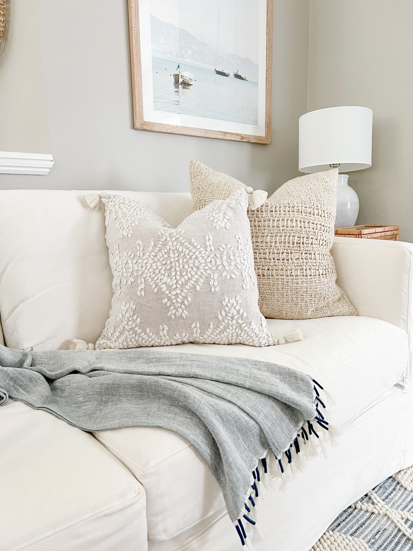 white sofa with two fall pillows
