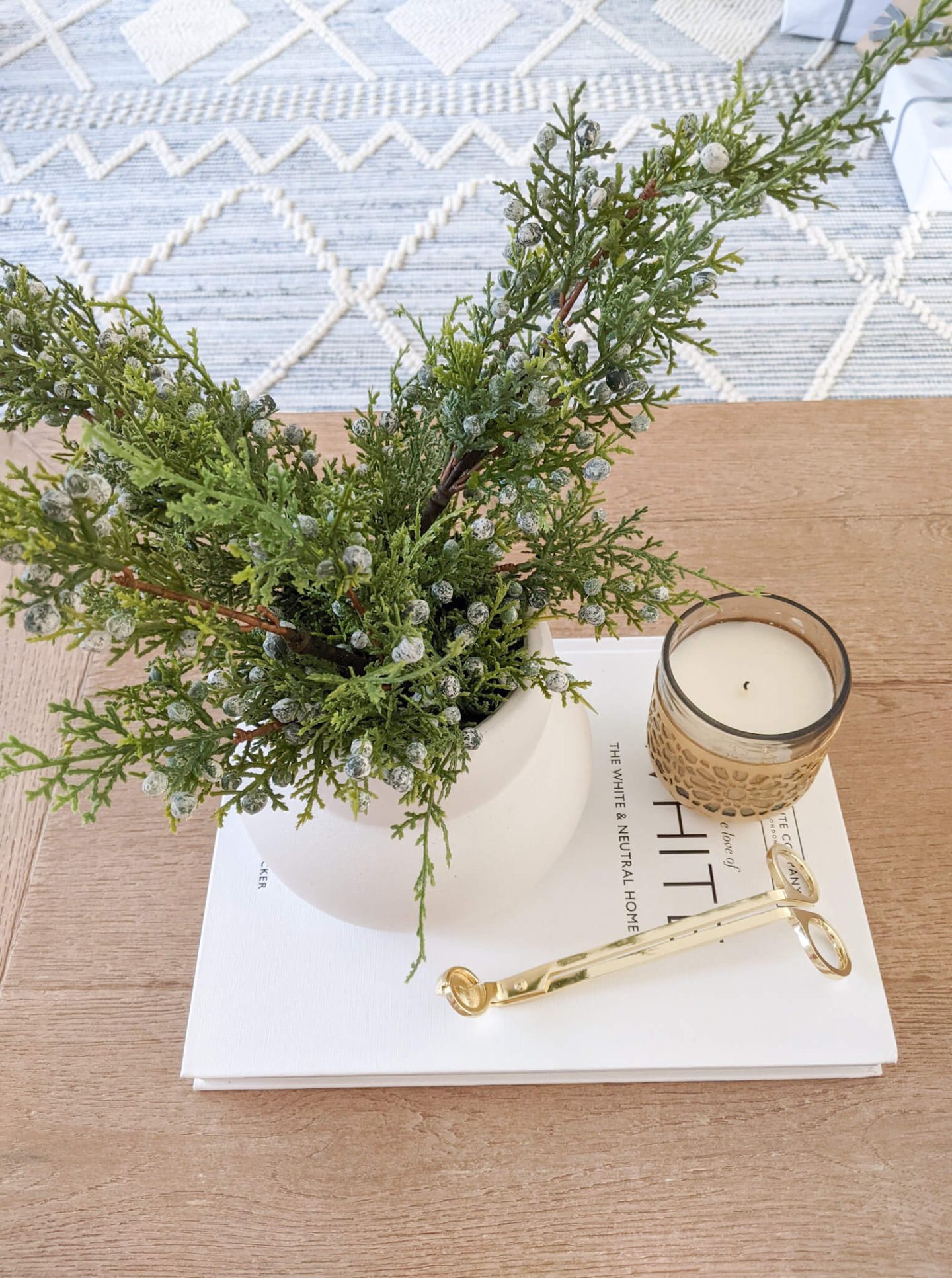silver ornaments in a bowl on a coffee table