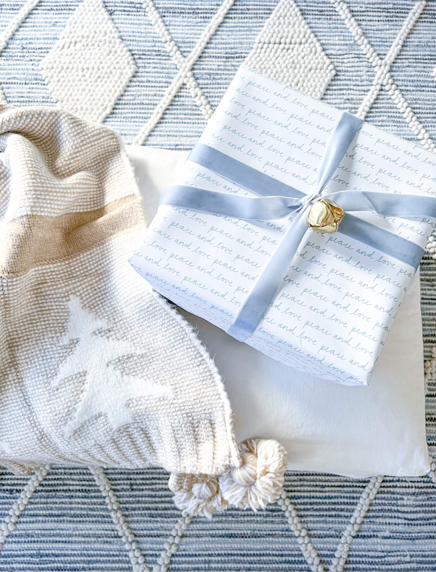 wrapped present with light blue velvet ribbon
